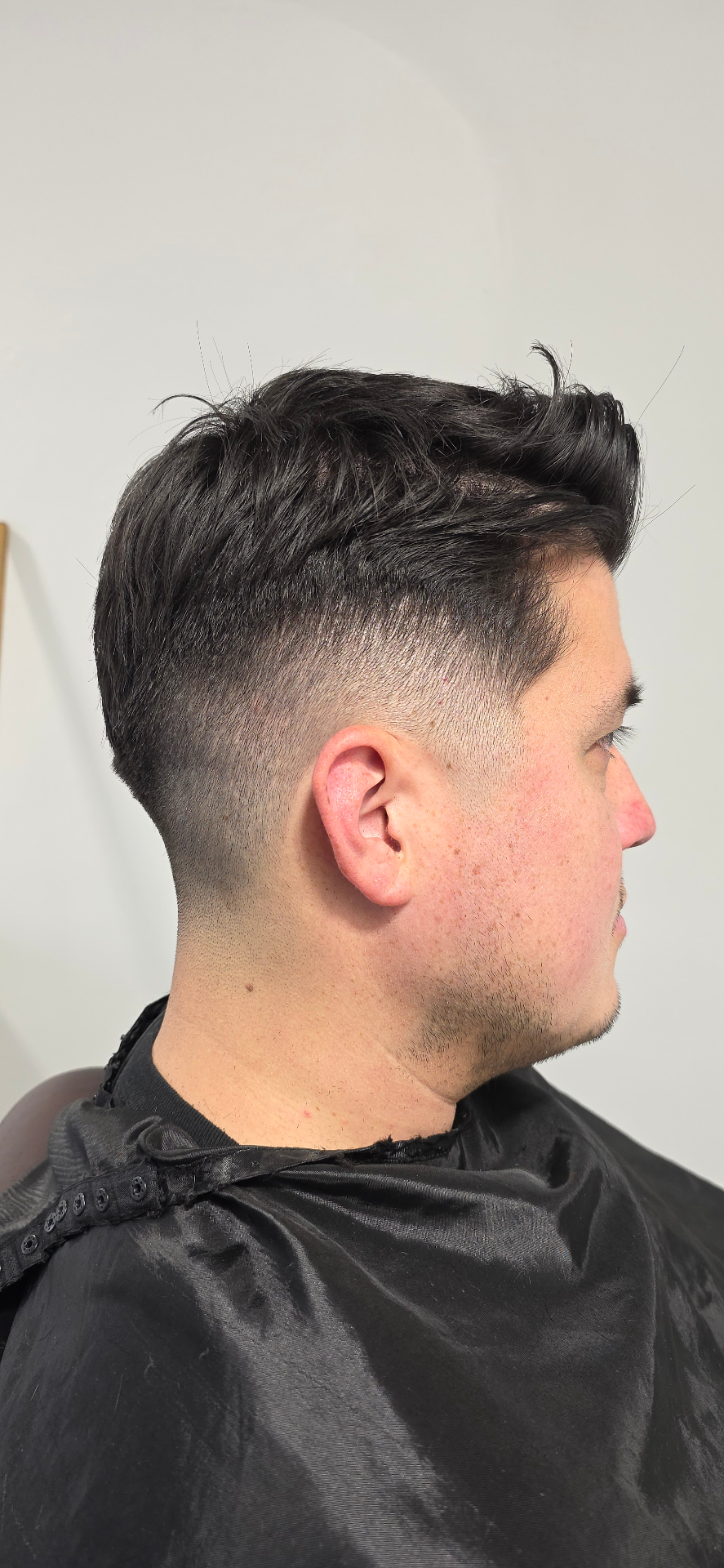 Drop fade. Heavy texture on top — Styled cut haircut at Subtraction Barbershop, Mission District SF